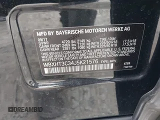 2018 BMW X1 xDrive28i with VIN WBXHT3C34J5K21576, listed as a IAAI auction lot 41822390 with 69,645 mi miles. Bid and sale history available at carsss.com. Image 9.