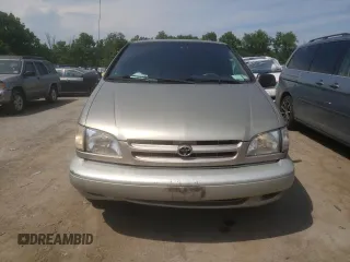 2000 Toyota Sienna LE with VIN 4T3ZF13C8YU219698, listed as a Copart auction lot 59733984 with 305,061 mi miles and Salvage Title. Bid and sale history available at carsss.com. Image 6.