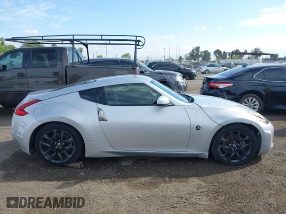 2018 Nissan 370Z Sport with VIN JN1AZ4EH7JM572602, listed as a IAAI auction lot 41902662 with 76,262 mi miles and . Bid and sale history available at DreamBid. Image 13.