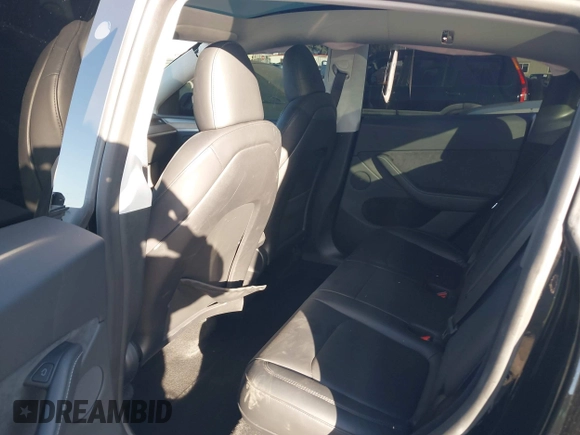 2024 Tesla Model Y Long Range with VIN 7SAYGDEEXRA216186, listed as a IAAI auction lot 41106653 with 25,331 mi miles and . Bid and sale history available at DreamBid. Image 8.