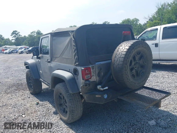 2015 Jeep Wrangler Freedom Edition with VIN 1C4AJWAG4FL589769, listed as a IAAI auction lot 42704488 with 194,414 mi miles and . Bid and sale history available at DreamBid. Image 3.