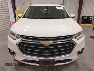2021 Chevrolet Traverse Premier with VIN 1GNEVKKW7MJ218772, listed as a IAAI auction lot 42306743 with 106,898 mi miles and . Bid and sale history available at DreamBid. Image 12.