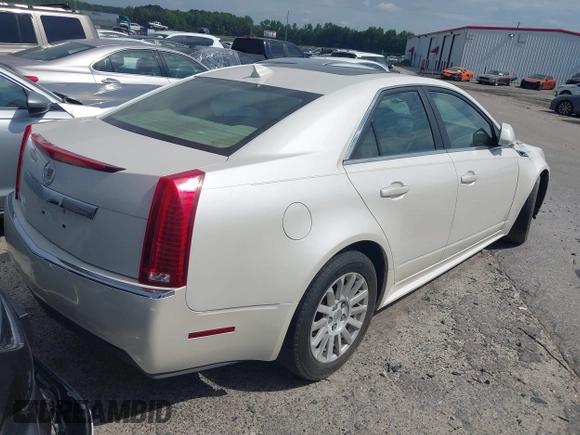 2012 Cadillac CTS Luxury with VIN 1G6DF5E55C0127450, listed as a IAAI auction lot 42020764 with 150,597 mi miles and . Bid and sale history available at DreamBid. Image 4.