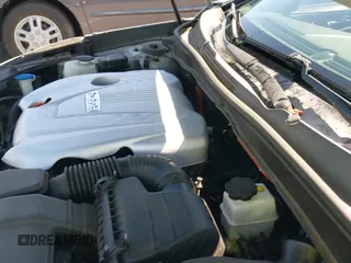 2014 Hyundai Sonata z VIN KMHEC4A42EA107277, wystawiony jako IAAI lot #42859723 z przebiegiem 153 125 mil mil oraz . Historia ofert i sprzedaży dostępna na DreamBid. Obrazek 19.