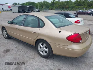 2003 Ford Taurus SES Standard with VIN 1FAFP55213A225447, listed as a IAAI auction lot 42206073 with 177,163 mi miles. Bid and sale history available at carsss.com. Image 3.