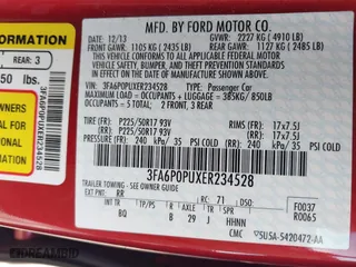 2014 Ford Fusion Energi SE Luxury with VIN 3FA6P0PUXER234528, listed as a IAAI auction lot 41644935 with 151,059 mi miles. Bid and sale history available at carsss.com. Image 9.
