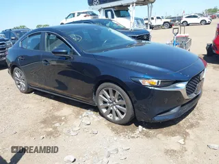 2021 Mazda 3 Select with VIN JM1BPABL7M1314973, listed as a IAAI auction lot 42011342 with 53,785 mi miles and . Bid and sale history available at DreamBid. Image 1.