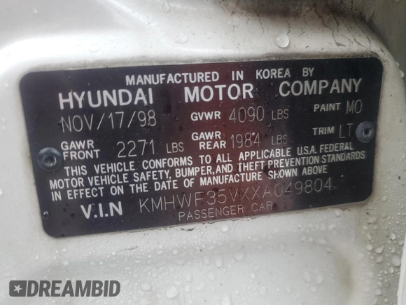 1999 Hyundai Sonata GLS with VIN KMHWF35VXXA049804, listed as a Copart auction lot 44175995 with 123,322 mi miles and Salvage Title. Bid and sale history available at carsss.com. Image 12.