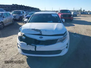 2016 Kia Optima LX with VIN 5XXGT4L36GG005859, listed as a IAAI auction lot 41053277 with 127,783 mi miles. Bid and sale history available at carsss.com. Image 12.