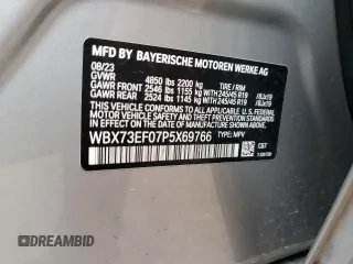2023 BMW X1 xDrive28i with VIN WBX73EF07P5X69766, listed as a Copart auction lot 62490105 with 9,193 mi miles and Salvage title. Bid and sale history available at DreamBid. Image 14.