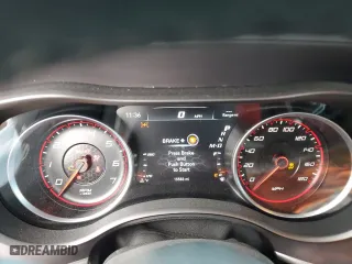 2022 Dodge Charger Scat Pack with VIN 2C3CDXGJXNH180037, listed as a Copart auction lot 77573324 with 15,583 mi miles and Salvage Title. Bid and sale history available at carsss.com. Image 9.