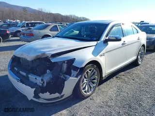 2013 Ford Taurus Limited with VIN 1FAHP2F82DG131585, listed as a IAAI auction lot 41076163 with 134,916 mi miles. Bid and sale history available at carsss.com. Image 6.