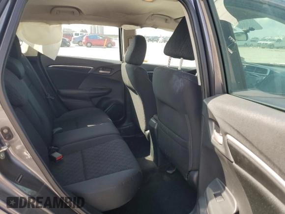 2015 Honda Fit LX с VIN 3HGGK5H59FM757797, выставлен на аукционе Copart как лот 58615175 с пробегом 109 608 миль миль и Списание • Salvage title. История ставок и продаж доступна на DreamBid. Изображение 10.