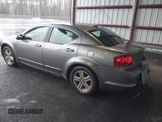 2012 Dodge Avenger SXT z VIN 1C3CDZCBXCN163432, wystawiony jako IAAI lot #39332608 z przebiegiem 169 102 mil mil oraz . Historia ofert i sprzedaży dostępna na DreamBid. Obrazek 3.