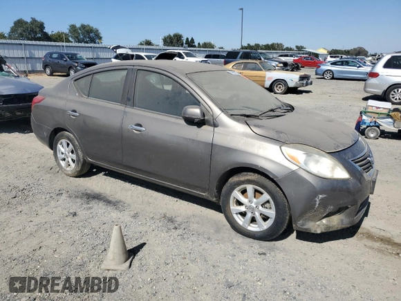 2012 Nissan Versa SV with VIN 3N1CN7AP1CL812288, listed as a Copart auction lot 63996355 with 128,229 mi miles and Clean title. Bid and sale history available at DreamBid. Image 4.