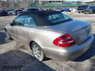 2004 Mercedes-Benz CLK-Class Cabriolet 3.2L with VIN WDBTK65GX4T012529, listed as a IAAI auction lot 41705903 with 66,947 mi miles. Bid and sale history available at carsss.com. Image 3.
