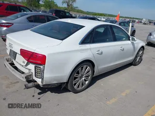 2011 Audi A8 z VIN WAUAVAFD7BN021601, wystawiony jako IAAI lot #42233726 z przebiegiem 182 583 mil mil oraz . Historia ofert i sprzedaży dostępna na DreamBid. Obrazek 4.