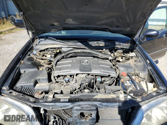 2004 Acura RL w/Navigation System with VIN JH4KA96624C004656, listed as a Copart auction lot 77021014 with 158,857 mi miles and Salvage Title. Bid and sale history available at carsss.com. Image 12.