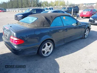 2003 Mercedes-Benz CLK 4.3L with VIN WDBLK70G13T144039, listed as a IAAI auction lot 42013311 with 121,440 mi miles. Bid and sale history available at carsss.com. Image 4.