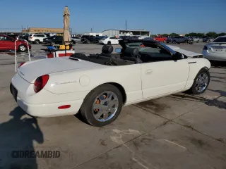 2002 Ford Thunderbird Hardtop Premium z VIN 1FAHP60A52Y115214, wystawiony jako Copart lot #70801894 z przebiegiem Nie podano mil oraz Szkoda całkowita • Salvage title. Historia ofert i sprzedaży dostępna na DreamBid. Obrazek 3.