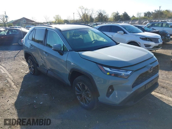 2023 Toyota RAV4 Hybrid XLE Premium with VIN JTMB6RFV3PD116696, listed as a IAAI auction lot 42044933 with 18,553 mi miles. Bid and sale history available at carsss.com. Image 1.