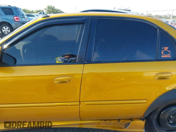 1997 Honda Civic EX z VIN 2HGEJ8646VH587451, wystawiony jako IAAI lot #42102826 z przebiegiem 13 144 mil mil oraz . Historia ofert i sprzedaży dostępna na DreamBid. Obrazek 15.