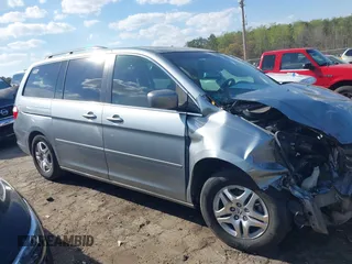 2007 Honda Odyssey EX-L with VIN 5FNRL38677B054173, listed as a IAAI auction lot 41888792 with 142,438 mi miles and . Bid and sale history available at DreamBid. Image 13.