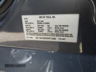 2023 Tesla Model Y Performance z VIN 7SAYGDEF6PF774965, wystawiony jako IAAI lot #41655550 z przebiegiem 33 824 mil mil oraz . Historia ofert i sprzedaży dostępna na DreamBid. Obrazek 9.