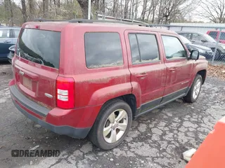 2013 Jeep Patriot Latitude with VIN 1C4NJPFA3DD237804, listed as a IAAI auction lot 41876591 with 73,852 mi miles. Bid and sale history available at carsss.com. Image 4.