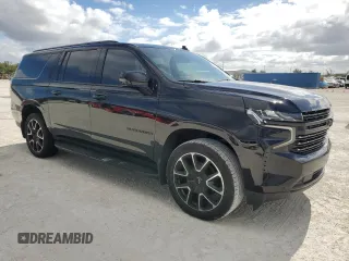 2022 Chevrolet Suburban with VIN 1GNSCEKT7NR222257, listed as a Copart auction lot 84840904 with 113,761 mi miles and Salvage title. Bid and sale history available at DreamBid. Image 4.