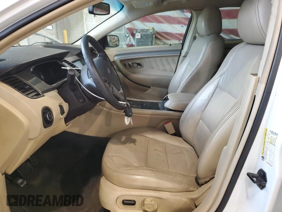 2014 Ford Taurus SEL z VIN 1FAHP2E89EG121025, wystawiony jako Copart lot #55405535 z przebiegiem 168 004 mil mil oraz Czysty tytuł • Clean title. Historia ofert i sprzedaży dostępna na DreamBid. Obrazek 7.