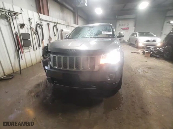2012 Jeep Grand Cherokee Overland with VIN 1C4RJFCG0CC248462, listed as a Copart auction lot 46648895 with 99,479 mi miles and Salvage Title. Bid and sale history available at carsss.com. Image 13.
