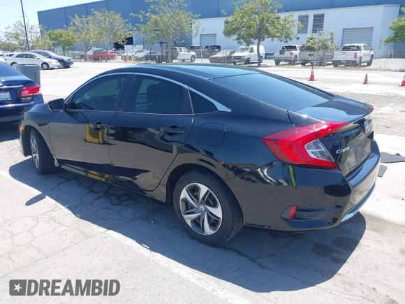 2020 Honda Civic LX with VIN 19XFC2F66LE213975, listed as a IAAI auction lot 42398098 with 69,902 mi miles and . Bid and sale history available at DreamBid. Image 3.