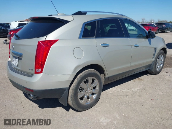 2015 Cadillac SRX Luxury Collection z VIN 3GYFNBE38FS641807, wystawiony jako IAAI lot #41669512 z przebiegiem 147 889 mil mil oraz . Historia ofert i sprzedaży dostępna na DreamBid. Obrazek 4.
