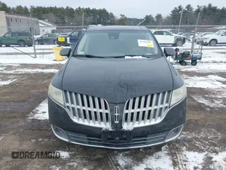 2011 Lincoln MKT with VIN 2LMHJ5AR5BBJ52058, listed as a IAAI auction lot 41305955 with 193,555 mi miles and . Bid and sale history available at DreamBid. Image 12.