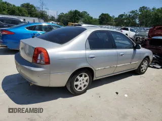 2004 Kia Spectra GS with VIN KNAFB161945141309, listed as a Copart auction lot 52395445 with 99,100 mi miles and Clean Title. Bid and sale history available at DreamBid. Image 3.