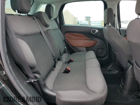 2014 FIAT 500L Trekking with VIN ZFBCFADH1EZ007143, listed as a Copart auction lot 52030065 with 90,894 mi miles and Salvage title. Bid and sale history available at DreamBid. Image 10.