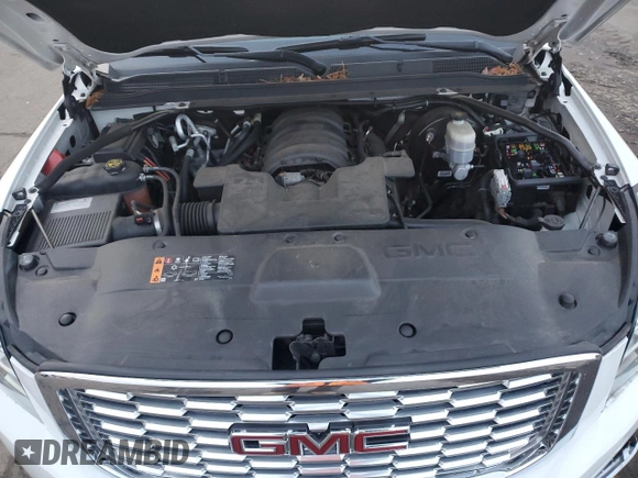 2020 GMC Yukon XL Denali with VIN 1GKS2HKJ1LR299560, listed as a Copart auction lot 84943284 with 99,084 mi miles and Salvage Title. Bid and sale history available at carsss.com. Image 14.