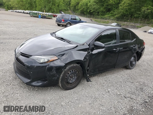 2019 Toyota Corolla L z VIN 5YFBURHE6KP870832, wystawiony jako Copart lot #57884205 z przebiegiem 132 860 mil mil oraz Szkoda całkowita • Salvage title. Historia ofert i sprzedaży dostępna na DreamBid. Obrazek 1.