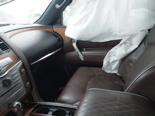 2015 Infiniti QX80 with VIN JN8AZ2NEXF9087473, listed as a IAAI auction lot 41282361 with Not provided miles and . Bid and sale history available at DreamBid. Image 5.