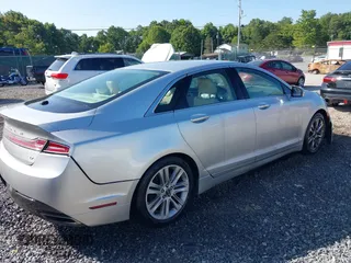 2013 Lincoln MKZ с VIN 3LN6L2GK5DR810147, выставлен на аукционе IAAI как лот 40102072 с пробегом 133 690 миль миль и . История ставок и продаж доступна на DreamBid. Изображение 4.