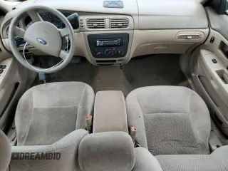 2006 Ford Taurus SE z VIN 1FAFP53U56A151555, wystawiony jako Copart lot #55227665 z przebiegiem 146 109 mil mil oraz Szkoda całkowita • Salvage title. Historia ofert i sprzedaży dostępna na DreamBid. Obrazek 8.