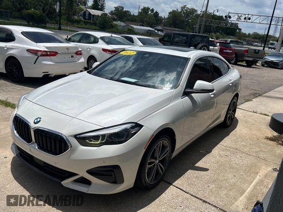 2022 BMW 2 Series 228i with VIN WBA53AK06N7K11876, listed as a Copart auction lot 64324665 with 115,646 mi miles and Clean title. Bid and sale history available at DreamBid. Image 2.