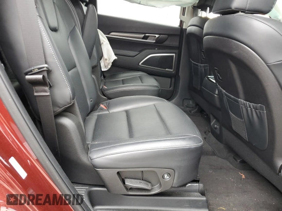 2023 Kia Telluride S z VIN 5XYP6DGC9PG392131, wystawiony jako Copart lot #57106315 z przebiegiem 9 888 mil mil oraz Szkoda całkowita • Salvage title. Historia ofert i sprzedaży dostępna na DreamBid. Obrazek 11.