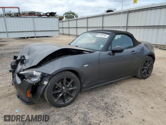 2016 Mazda MX-5 Miata Club z VIN JM1NDAC73G0103805, wystawiony jako Copart lot #51724195 z przebiegiem 76 522 mil mil oraz Szkoda całkowita • Salvage title. Historia ofert i sprzedaży dostępna na DreamBid. Obrazek 1.