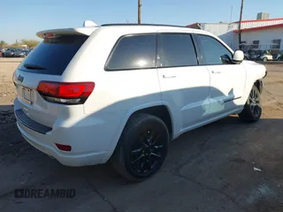 2020 Jeep Grand Cherokee Altitude with VIN 1C4RJEAG1LC251934, listed as a IAAI auction lot 41480299 with 74,169 mi miles and . Bid and sale history available at DreamBid. Image 4.