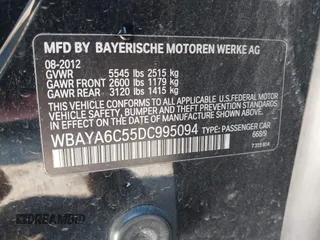 2013 BMW 7 Series 740i with VIN WBAYA6C55DC995094, listed as a IAAI auction lot 41246796 with 164,394 mi miles. Bid and sale history available at carsss.com. Image 9.