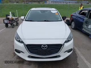 2018 Mazda 3 Touring with VIN 3MZBN1V32JM190611, listed as a IAAI auction lot 42032844 with 63,493 mi miles and . Bid and sale history available at DreamBid. Image 13.