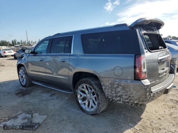 2020 GMC Yukon XL Denali with VIN 1GKS1HKJ8LR293922, listed as a Copart auction lot 76233074 with 67,273 mi miles and Salvage Title. Bid and sale history available at carsss.com. Image 2.