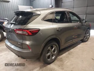 2023 Ford Escape ST-Line Select z VIN 1FMCU9NZXPUA40548, wystawiony jako IAAI lot #42326063 z przebiegiem 24 047 mil mil oraz . Historia ofert i sprzedaży dostępna na DreamBid. Obrazek 4.